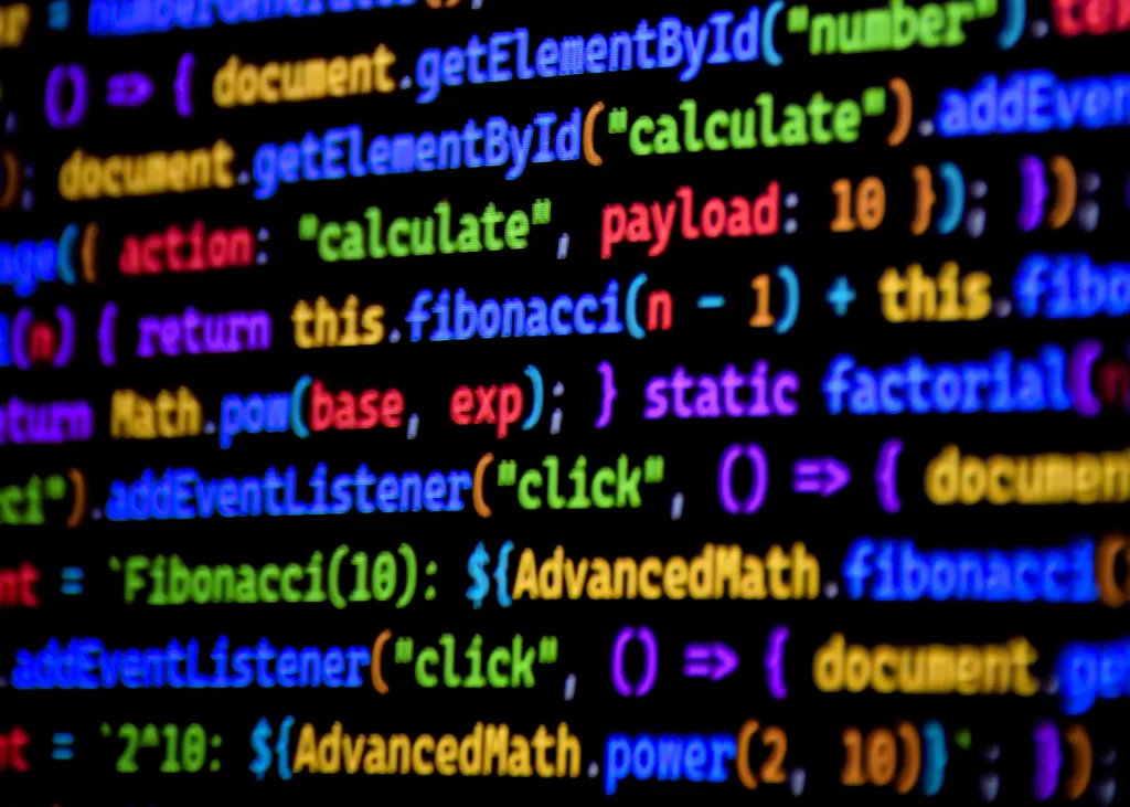 Código de programación JavaScript en un editor - ejemplo de desarrollo a medida