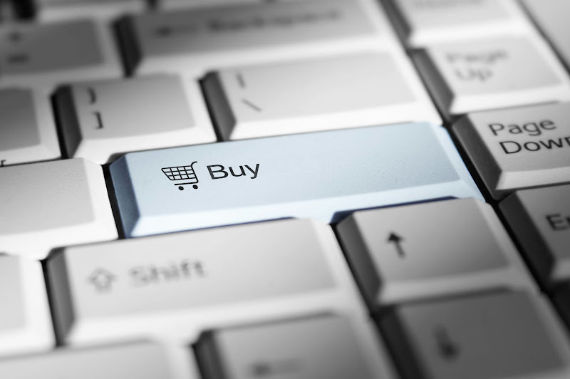 Tecla de teclado con icono de carrito y la palabra Buy que representa un CTA de compra